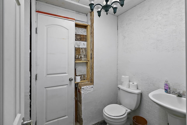 bathroom with sink and toilet