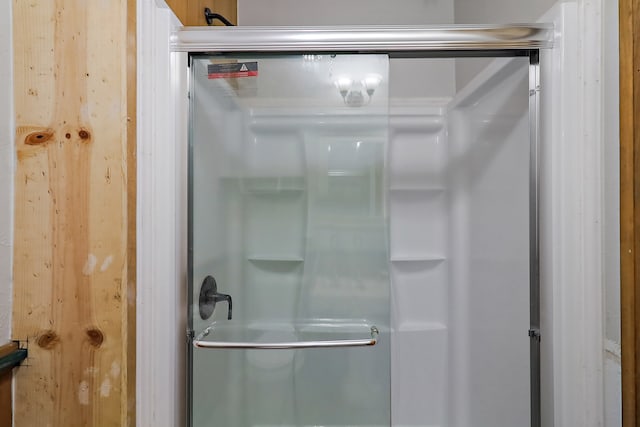 bathroom featuring an enclosed shower