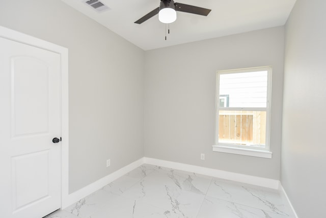 spare room featuring ceiling fan