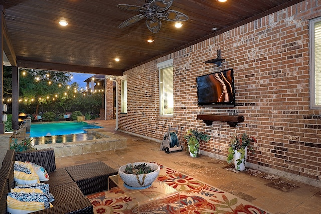 view of patio featuring an outdoor living space and ceiling fan