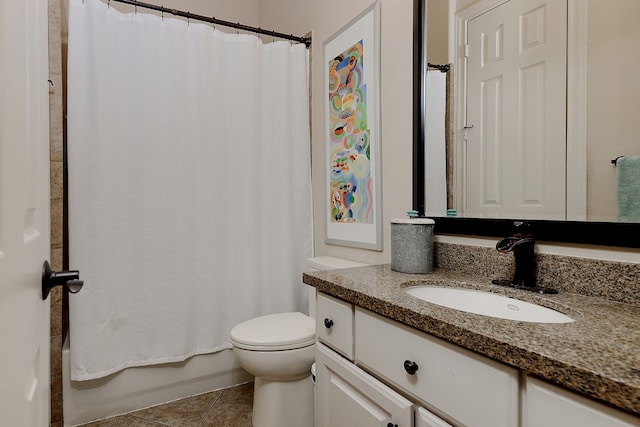 full bathroom with tile patterned floors, toilet, vanity, and shower / bathtub combination with curtain