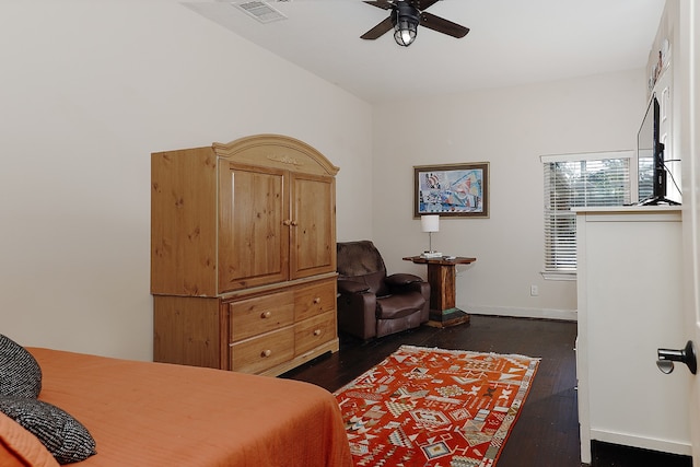 bedroom featuring ceiling fan and dark hardwood / wood-style flooring