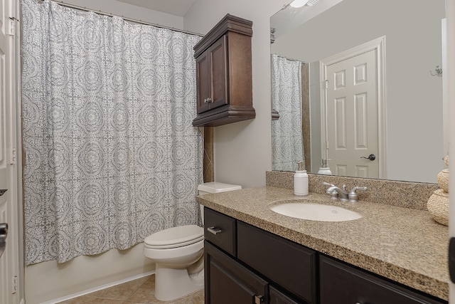 full bathroom featuring shower / bath combination with curtain, tile patterned floors, vanity, and toilet