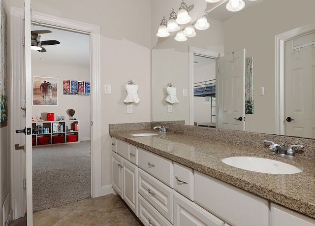 bathroom with ceiling fan, vanity, and tile patterned floors