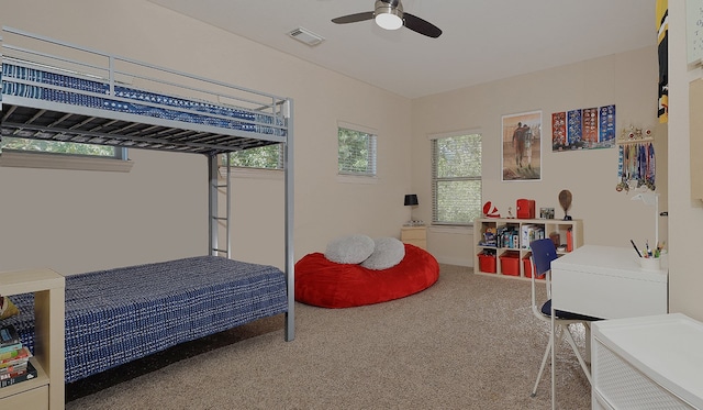 carpeted bedroom featuring ceiling fan