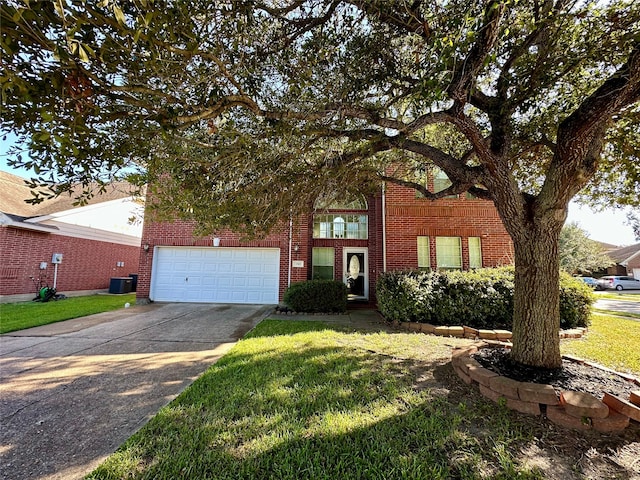 view of front of home with central AC and a front lawn