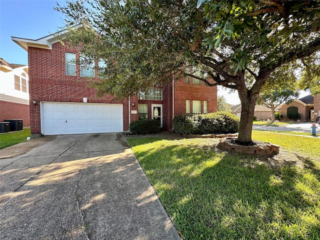 view of front facade with a garage, a front lawn, and central AC