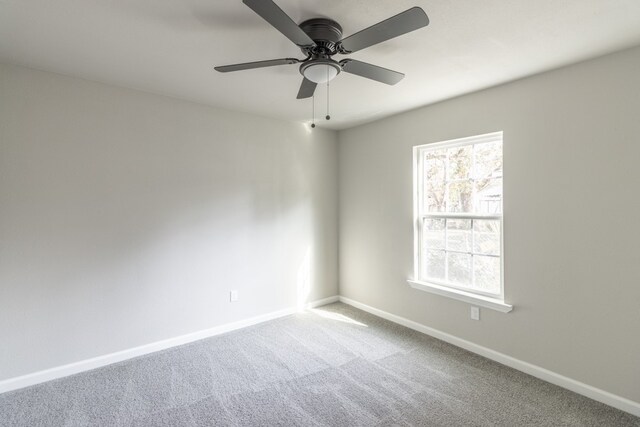 unfurnished room featuring carpet flooring and ceiling fan