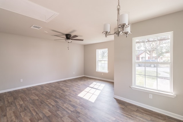 spare room with ceiling fan and dark hardwood / wood-style floors