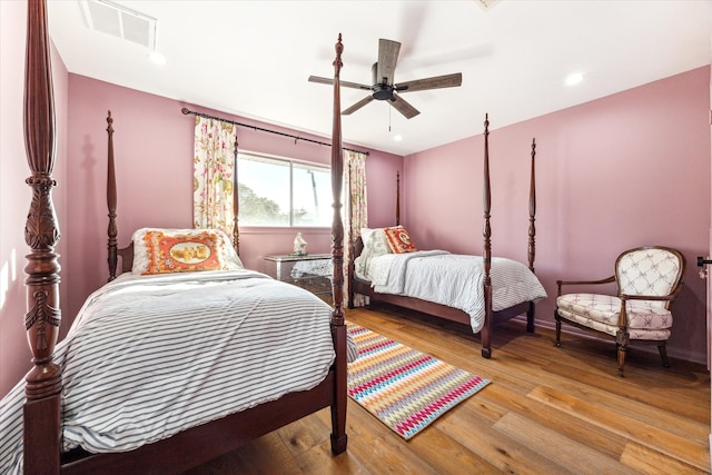 bedroom featuring ceiling fan and light wood-type flooring