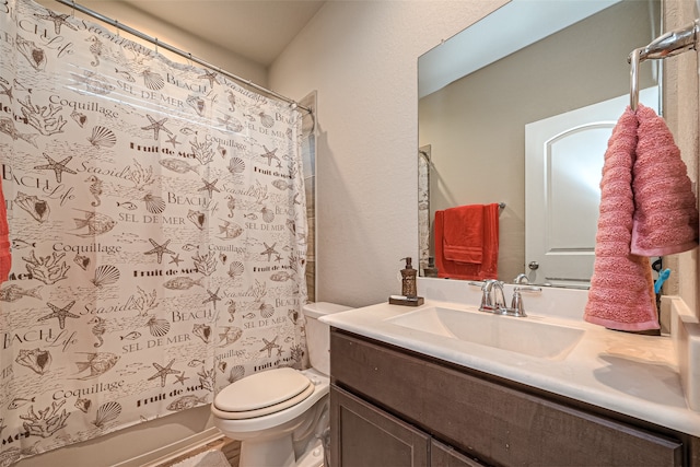 full bathroom featuring vanity, toilet, and shower / bath combo