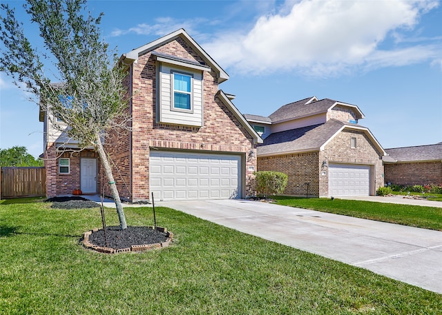 view of front property with a front yard and a garage