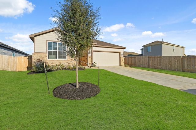 view of front of house with a front lawn and a garage