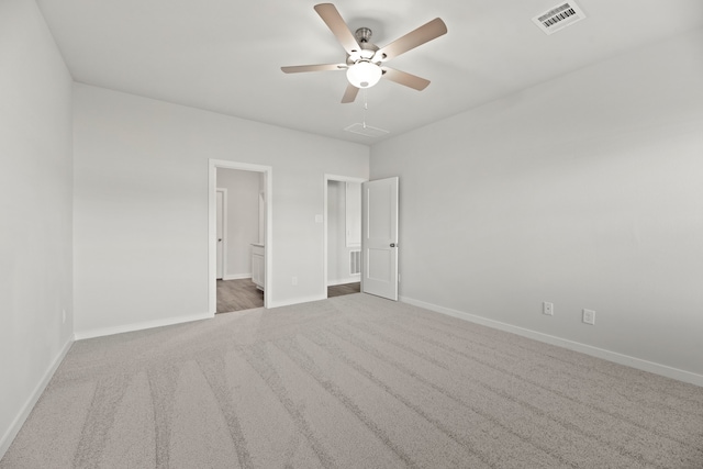 unfurnished bedroom featuring carpet floors and ceiling fan