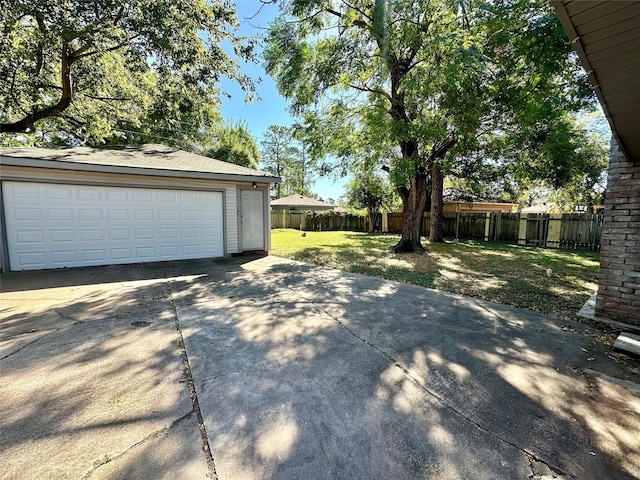 garage with a lawn