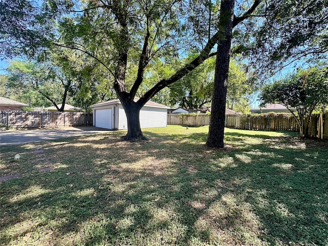 view of yard featuring a garage