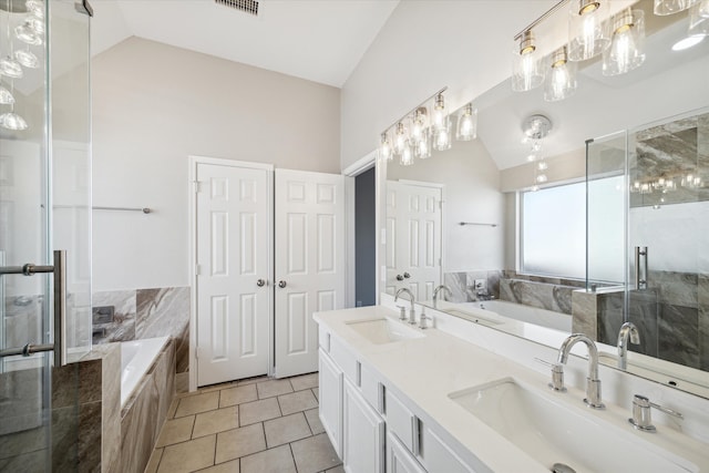 bathroom with high vaulted ceiling, tile patterned floors, vanity, and shower with separate bathtub