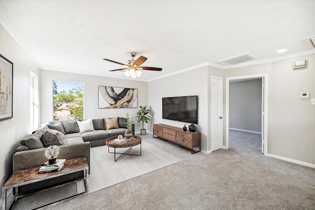 carpeted living room featuring ornamental molding and ceiling fan