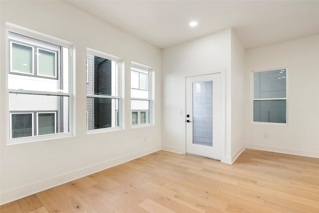 entrance foyer featuring light wood-type flooring