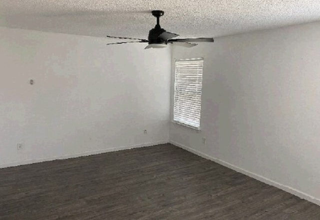 7432 Ashbourne Way, Fort Worth, TX 76133 - empty room with a textured ceiling, dark wood-style floors, ceiling fan, and baseboards