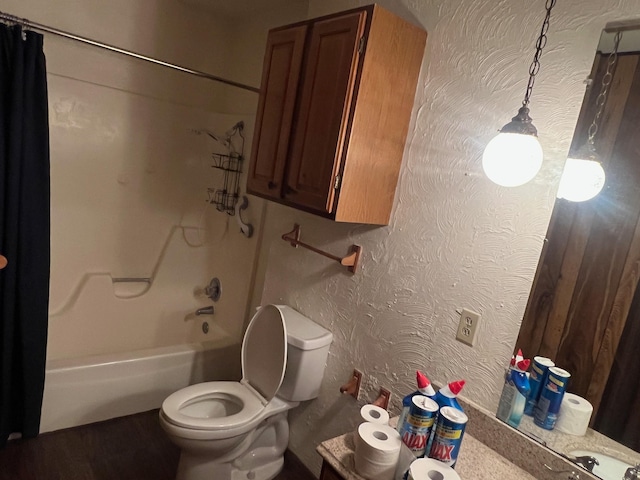 bathroom with shower / bath combo with shower curtain and toilet