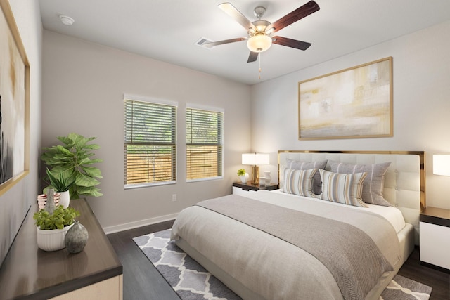 bedroom with ceiling fan and dark hardwood / wood-style flooring