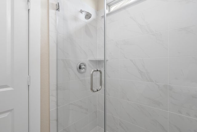 bathroom with an enclosed shower