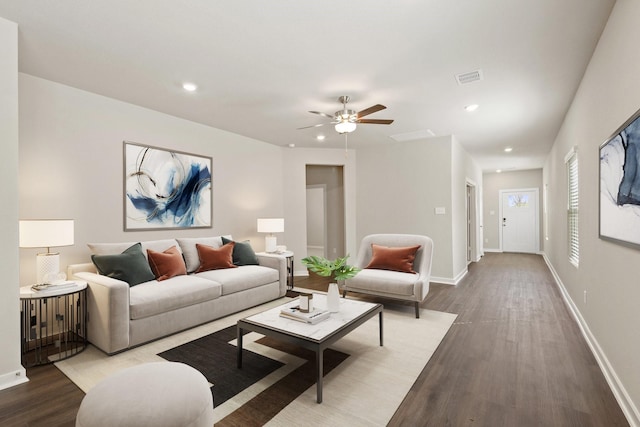 living room with hardwood / wood-style floors and ceiling fan