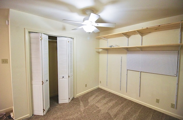 unfurnished bedroom featuring carpet and ceiling fan