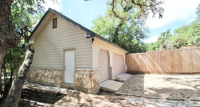 view of outbuilding with a garage