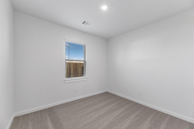 empty room featuring carpet floors