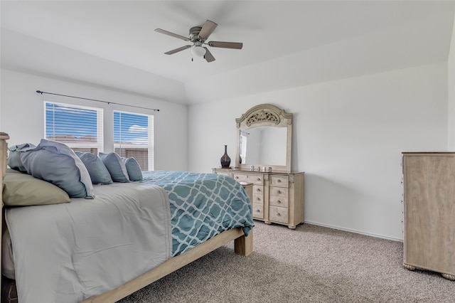 bedroom featuring ceiling fan and light carpet