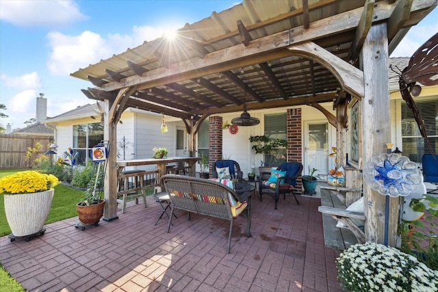 view of patio featuring a pergola