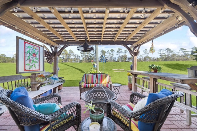 view of patio / terrace with a pergola and an outdoor living space with a fire pit