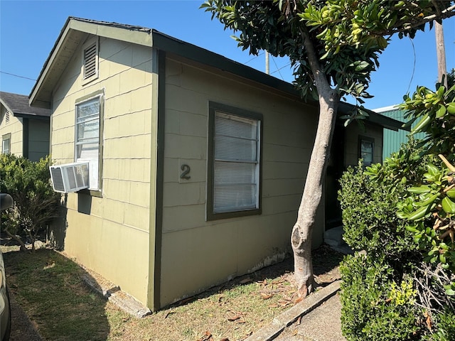 view of property exterior with cooling unit