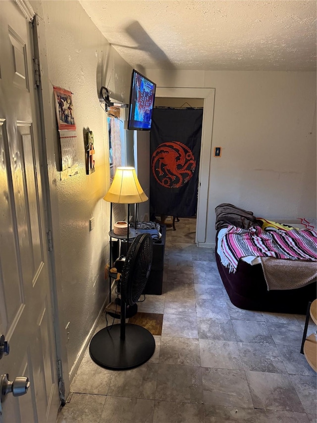 1612 Houston Blvd Unit 16, South Houston, TX 77587 - bedroom with a textured ceiling