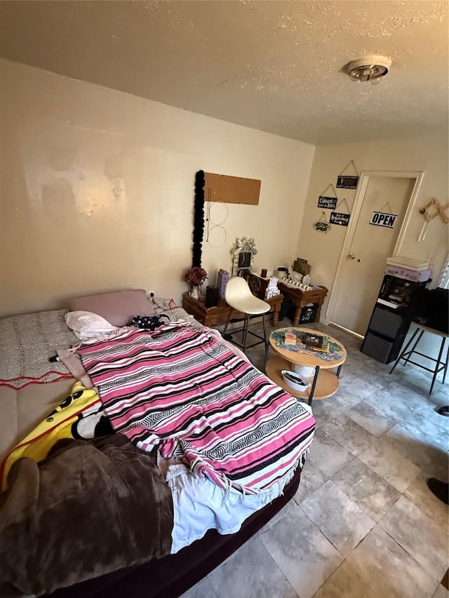 1612 Houston Blvd Unit 16, South Houston, TX 77587 - bedroom featuring a textured ceiling