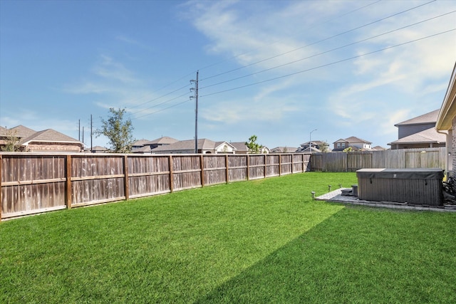 view of yard featuring a hot tub