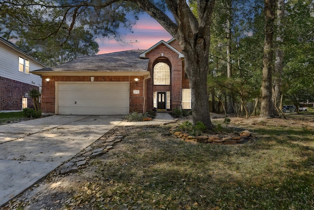 view of front of home with a garage