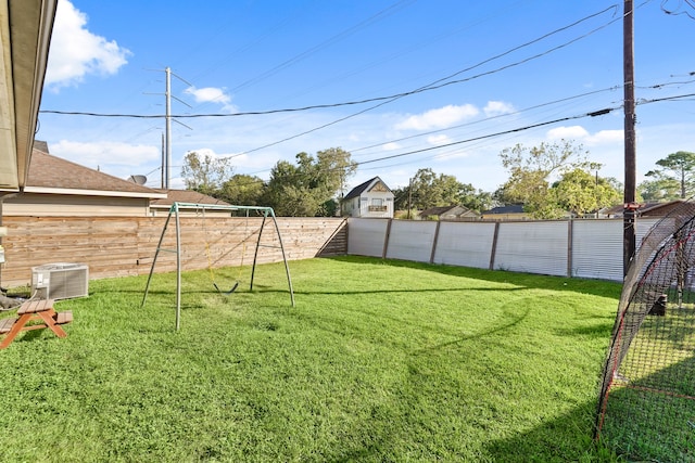 view of yard with central AC