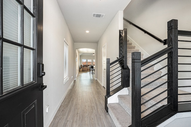 foyer with light hardwood / wood-style floors