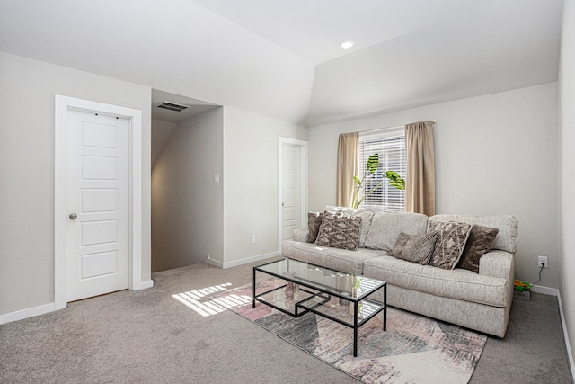 living room featuring lofted ceiling and carpet flooring