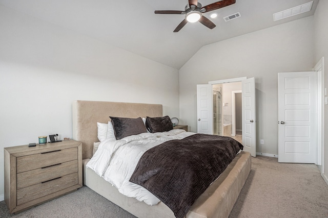 carpeted bedroom featuring ceiling fan, connected bathroom, and vaulted ceiling