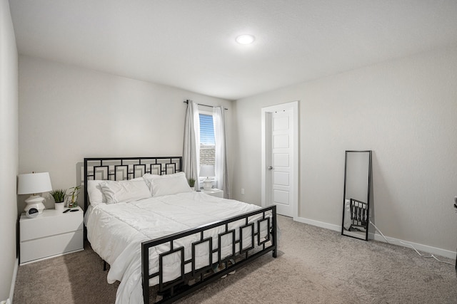 bedroom featuring carpet