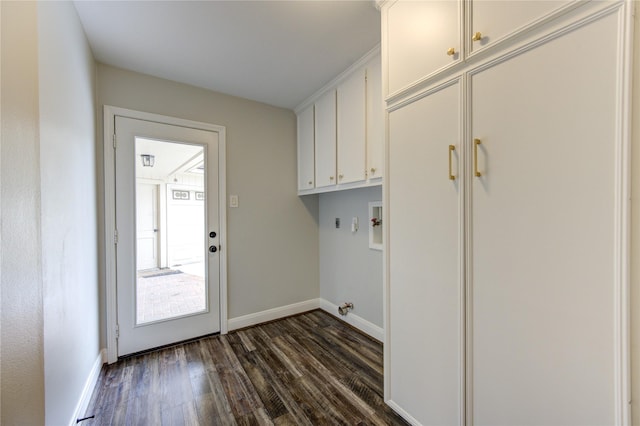 laundry area featuring cabinets, hookup for a washing machine, dark hardwood / wood-style floors, and electric dryer hookup