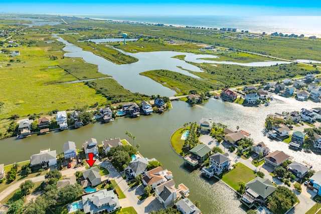 drone / aerial view with a water view