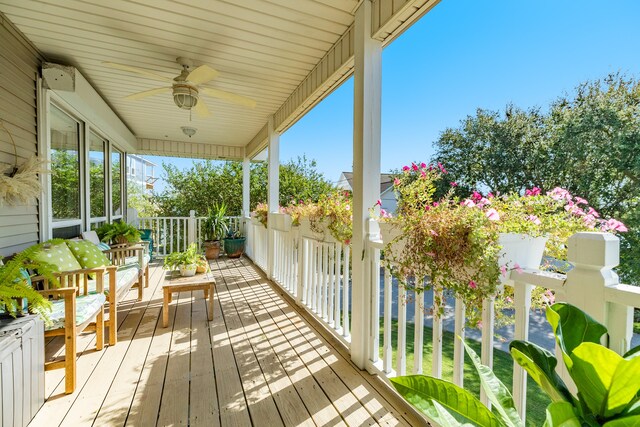 wooden terrace with ceiling fan