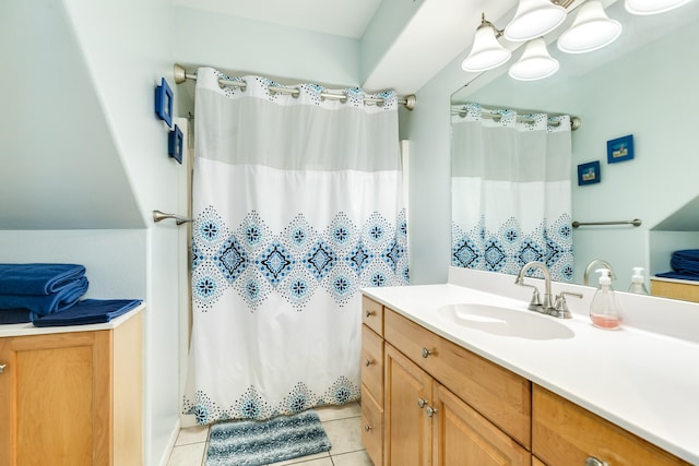 bathroom with vanity and tile patterned floors