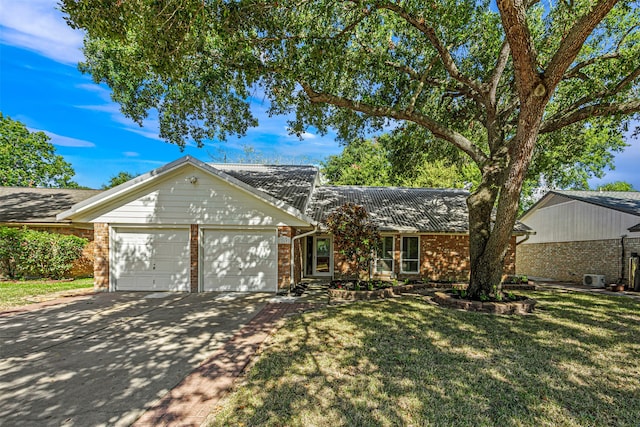 single story home with a front lawn and a garage