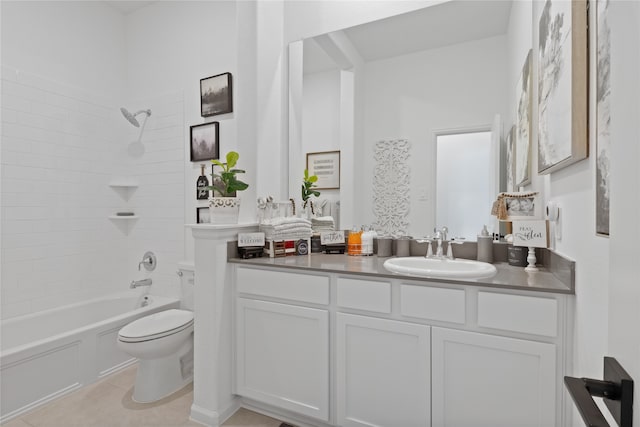 full bathroom with tile patterned floors, toilet, vanity, and tiled shower / bath combo